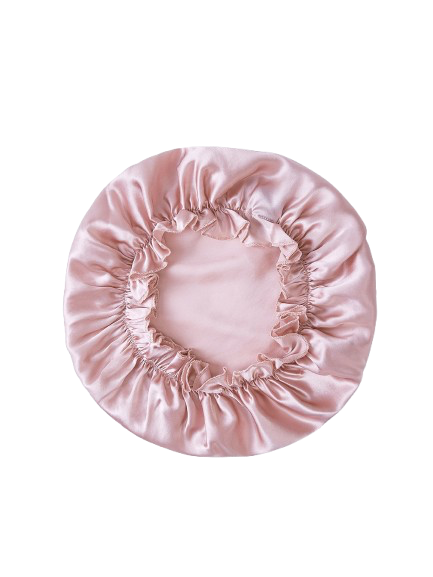 Bonnet de nuit en soie de mûrier 100% double épaisseur coloris rose poudré pour protéger les cheveux.