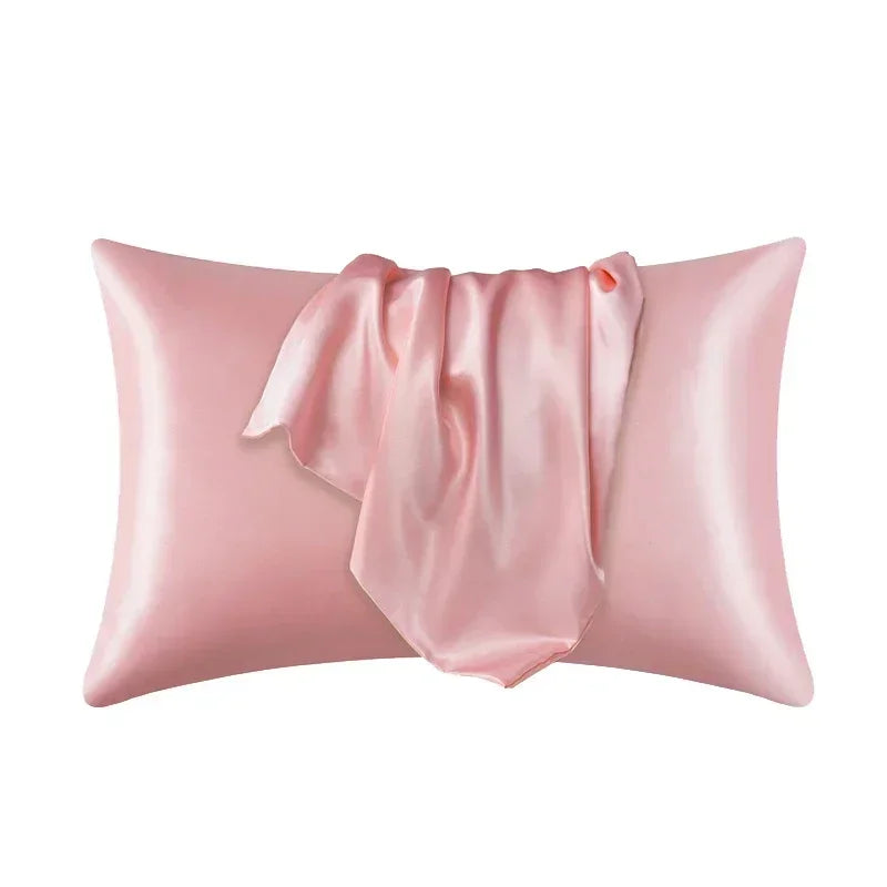 Taie d'oreiller en soie rose poudré pour protection des cheveux et de la peau, confort luxe KAÏMINA.